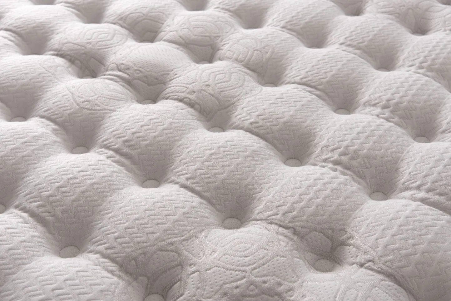 Capitonnage du surmatelas intégré du matelas Hypnos