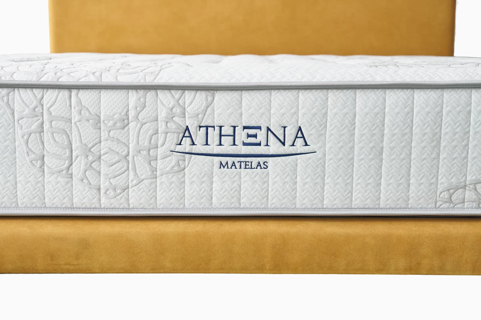 Broderie Athena sur le flanc du matelas